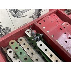 Meccano Set No.5 wooden box containing quantity of predominantly red and green sections, parts, brackets, wheels etc and instruction booklet