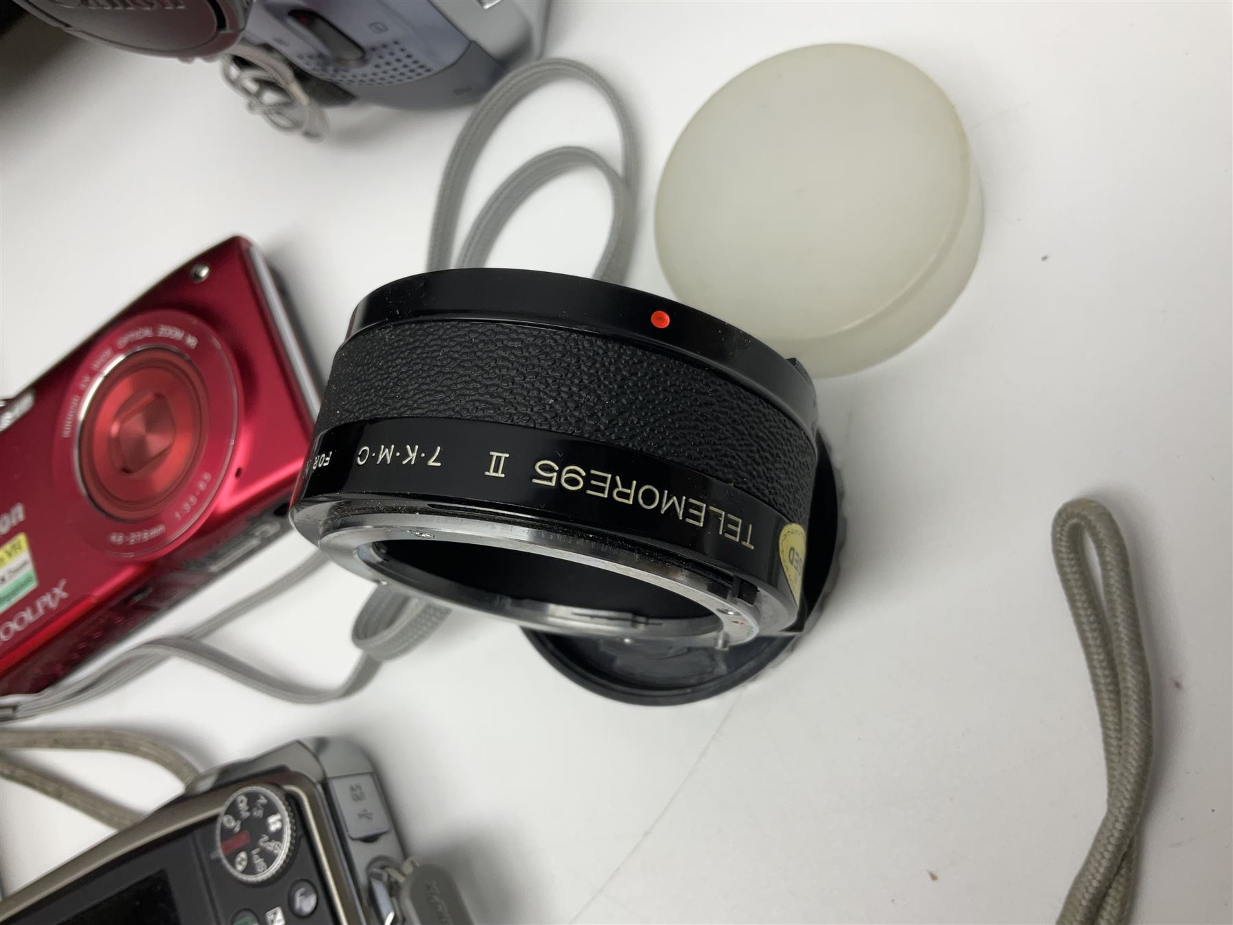 Nikon Coolpix 8700 camera body, serial no 3220838, with Zoom Nikkor Ed 8.9-71.2mm 1:2.8-4.2 lens, together with Canon digital video camcorder and other digital cameras and camera equipment