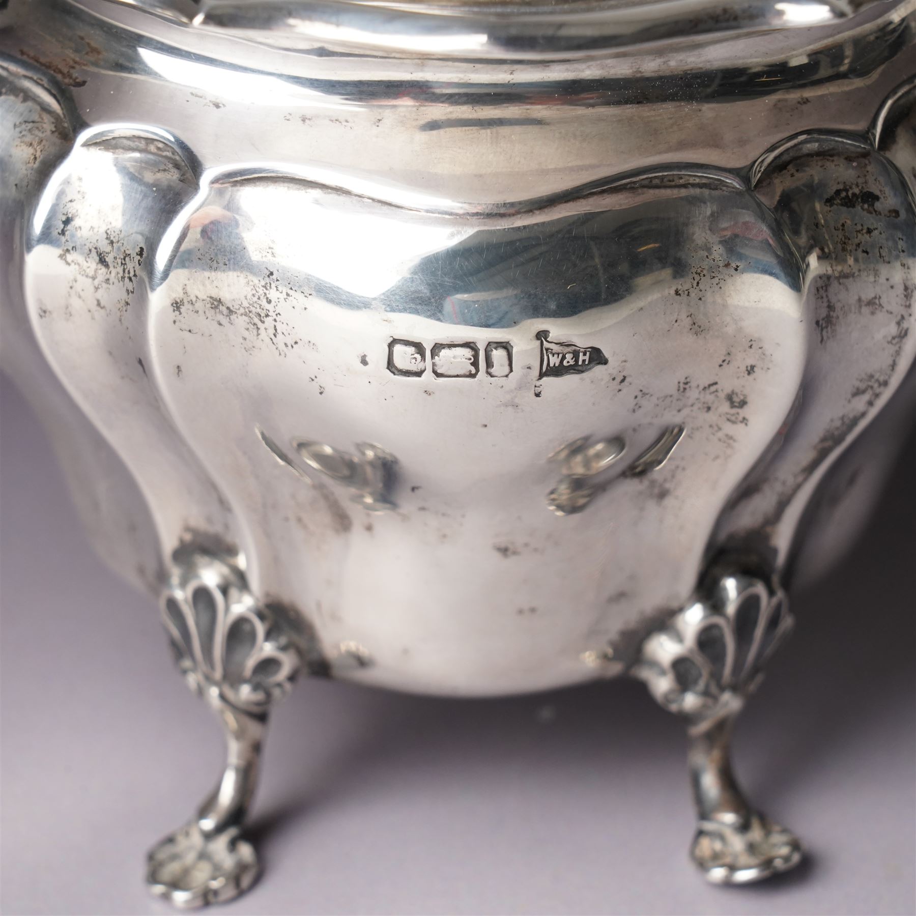 Edwardian silver tea caddy of fluted oval form with shaped supports Sheffield 1903 Maker Walker & Hall  