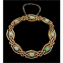 Early 20th century rose gold opal link bracelet, stamped 9ct