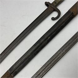 WWI Remington Pattern 1913 bayonet, the 43cm fullered blade with various marks to the ricasso including date code 11 16; in leather covered scabbard with various stamps including JWB 17 L58cm overall; and a French Model 1866 sabre bayonet (no scabbard)