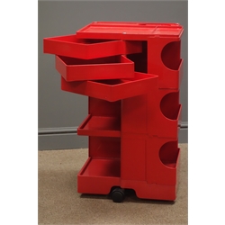  Red Joe Columbo 'boby' modular Office storage trolley, marked on base 'bieffeplast padova Italia designer joe colombo' patented with three swivel drawers shelves  and recess, signed in relief on base and on three black castors, W41, D43, H73  