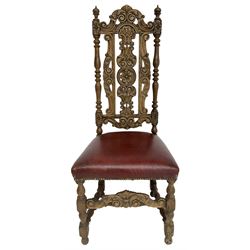 Carolean design oak high-back chair, the cresting rail carved with S-scrolls and foliage, the splat with a central flower head decorated with extending scrolls and acanthus leaves, upholstered seat, on turned and block supports united by S-scroll carved middle rail and turned stretchers