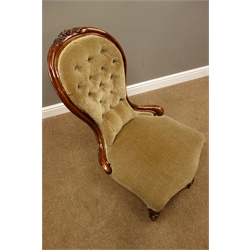  Victorian mahogany framed upholstered spoon back nursing chair, carved with flower heads   