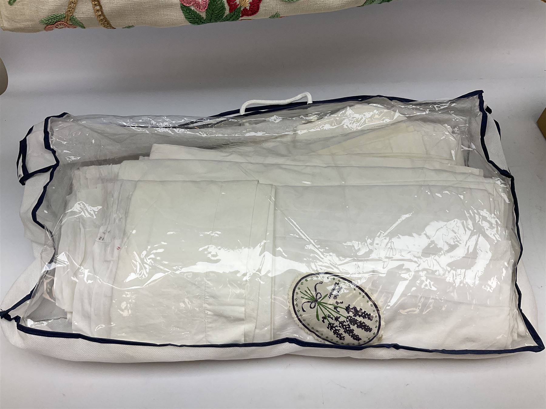 Large quantity of table linen and Victorian and later lace, framed machine tapestry depicting Greece, embroidered wall hanging decorated with a woodland scene with deer and blossoming tree, embroidered linen decorated with floral design, crochet, etc