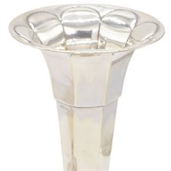 Two 1920s silver mounted trumpet vases, the first example of faceted form, hallmarked James Deakin & Sons, Sheffield 1921, the second example with fluted rim, hallmarked Walker & Hall, Birmingham 1922, tallest H25cm