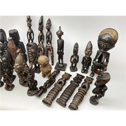 African carved wood figures, various forms and sizes including some with bead decoration, in two boxes