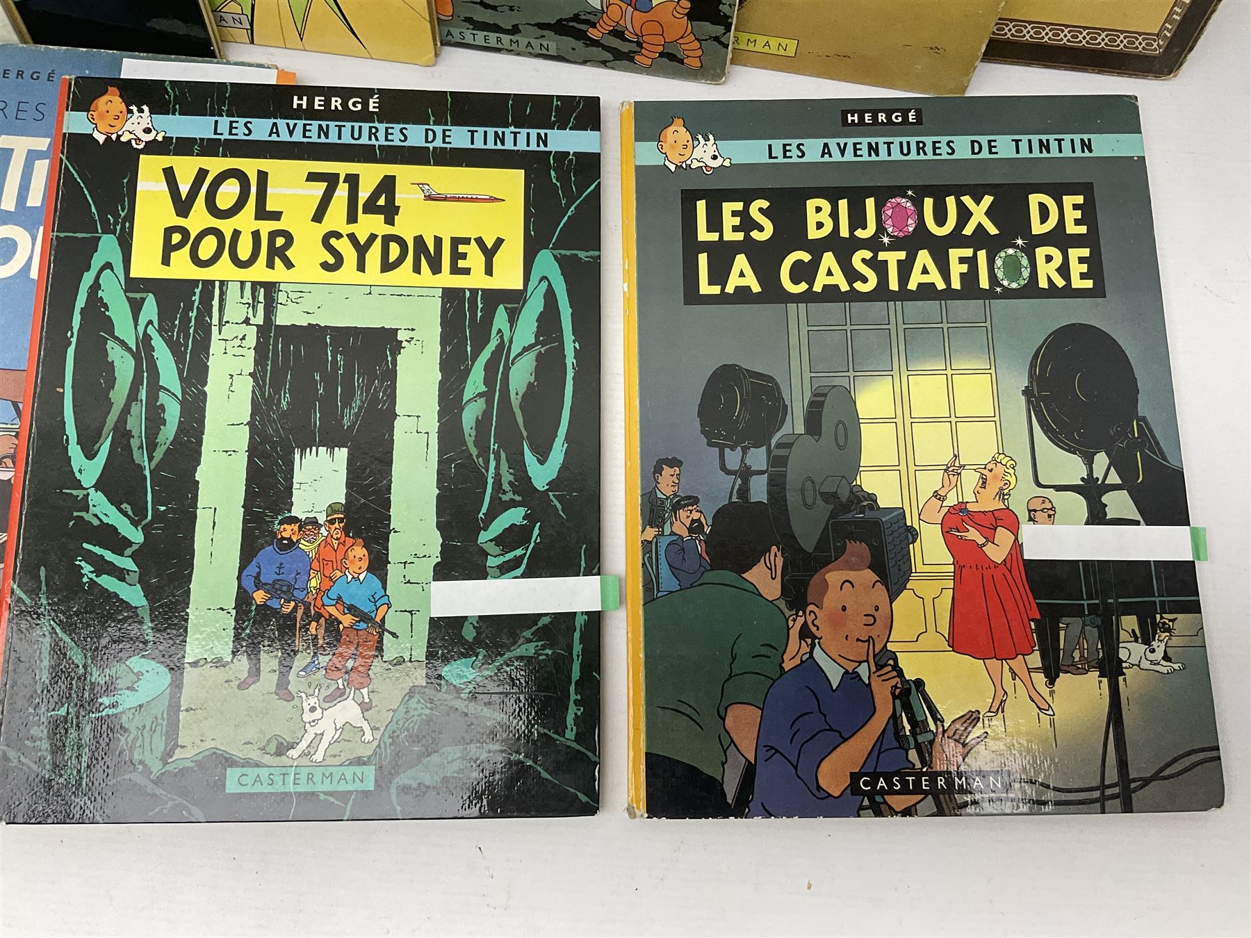 Twenty one first edition Herge, 'The Adventures of Tin Tin' books published by Casterman Bruxelles, with French text and coloured comic strip illustrations throughout; comprising Tintin Au Congo 1946, Tintin En Amerique 1946, Les Cigares du Pharaon 1955, Le Lotus Bleu 1946, L'Oreille Cassee 1943, L'ile Noire 1943, Le Sceptre d O'ttokar 1947, Le Crabe Aux Pinces D'or 1943, L'Etoile Mysterieuse 1942, Le Secret de la Licorne 1943, Le Tresors de Rackan Le Rouge 1945, Les 7 Boules de Cristal 1948, Le Temple du Soleil 1949, Au Pays de L'Or Noir 1950, Objectif Lune 1953, On a Marche sur la Lune 1954, L'Affaire Tournesol 1956, Coke en Stock 1958, Tintin au Tibet 1960, Les Bijous de la Castafiore 1963 and Vol 714 Pour Sydney 1968
