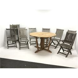 *Circular teak drop leaf garden table with gate leg base (D122cm, H76cm), and ten teak folding garden chairs 