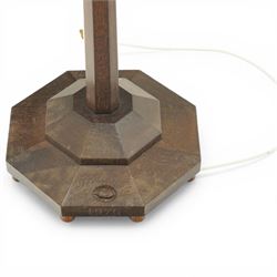 Acornman - dark stained oak standard lamp, supported on an octagonal column terminating in an octagonal base, with carved acorn signature, by the workshop of Alan Grainger of Brandsby 