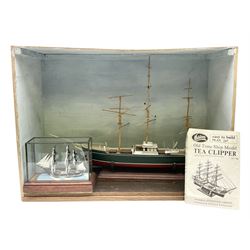 Boat model in box and another smaller in glazed diorama
