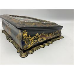 Victorian papier-mâché writing slope, of rectangular form with scalloped base, decorated throughout with gilt scrolls, the cover with central hand painted floral spray within a mother of pearl and abalone inlaid border, opening to reveal a red velvet lined slope and compartments, H10.5cm L32.5cm D24.5cm