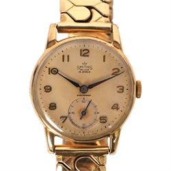 Smiths De Luxe gentleman's 9ct gold manual wind presentation wristwatch, Birmingham 1959, the back case engraved 'B.R London Midland Region W. Roe in appreciation of 45 years service', on expanding gilt strap