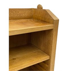 'Rabbitman' oak bookcase, fitted with three adjustable shelves, the top carved with rabbit signature, by Peter Heap of Wetwang