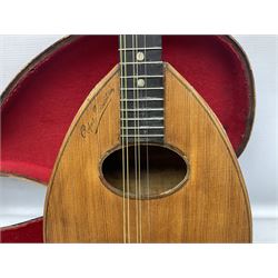 Early 20th century Italian Rafaele Disantino eight-string mandolin with two-piece back and spruce top with stamped Rafaele Disantino signature; bears maker's label L61cm; in wooden carrying case