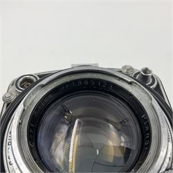 Rolleiflex Series E twin lens camera body, serial no. 1623867, with 'Planar 1.28 f-80mm' lens and 'Heidosmat 1:2.8/80' lens 