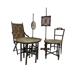 Folding campaign chair with Elephant upholstery; two mahogany pole screens with upholstery panels; two brass top folding benares tables; mahogany side chair with cane seat