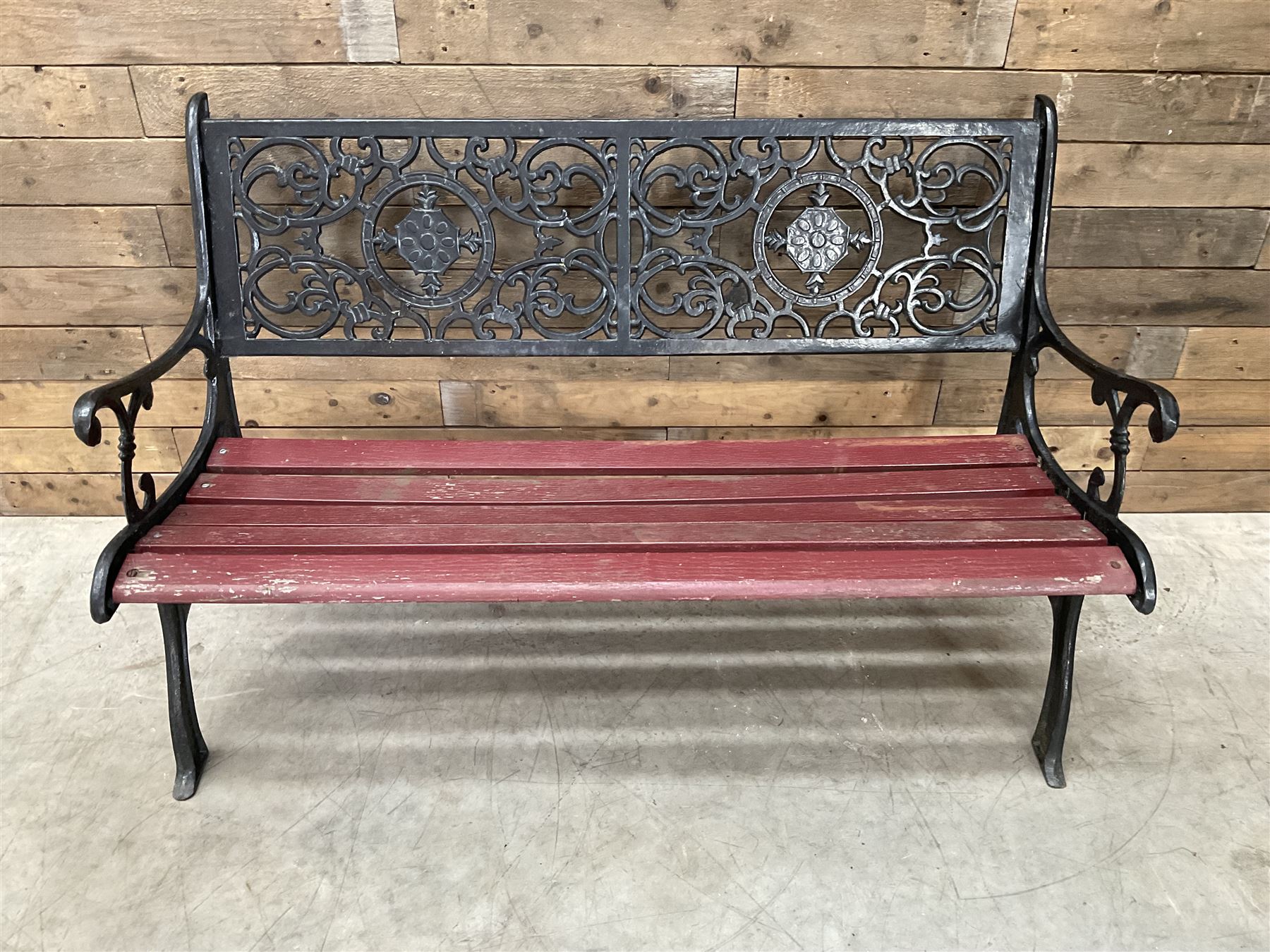 Cast iron and wood slatted garden bench