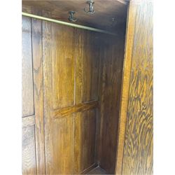 Early 20th century oak wardrobe, fitted with single mirror door, drawer to base