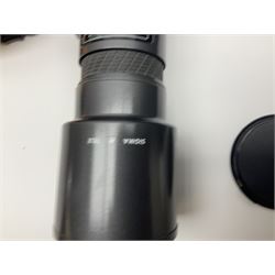 Four camera bodies, to include, Ricoh KR-10 serial no. 38826, Pentax MZ-M serial no. 4185969 with 'SMC Pentax- M 1:3.5 28mm' lens, Canon EOS500 serial no. 080927, with 'Sigma Zoom 100-300mm 1:4.5-6.7 DL'  lens etc, with other camera lenses and equipment 