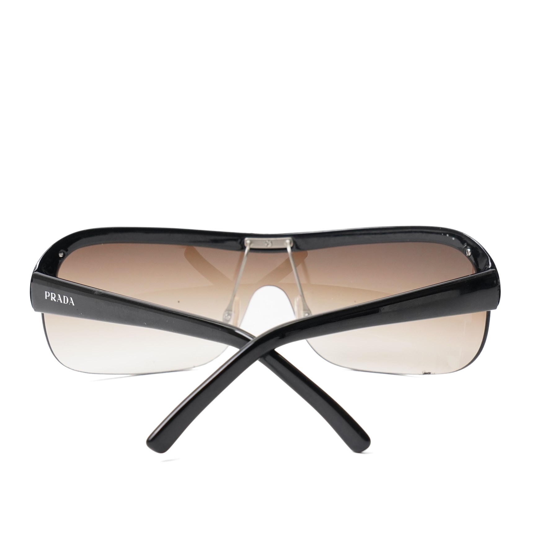 Prada - half-rim shield-style sunglasses in black acetate, with graduated smoke lenses and silver-tone PRADA lettering to the temples, in original hard case
