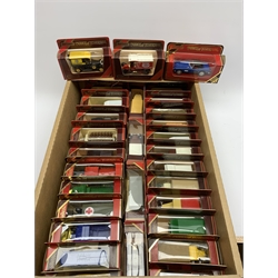 Thirty Matchbox Models of Yesteryear including promotional commercial vehicles, military ambulance, cars, bus etc, all boxed
