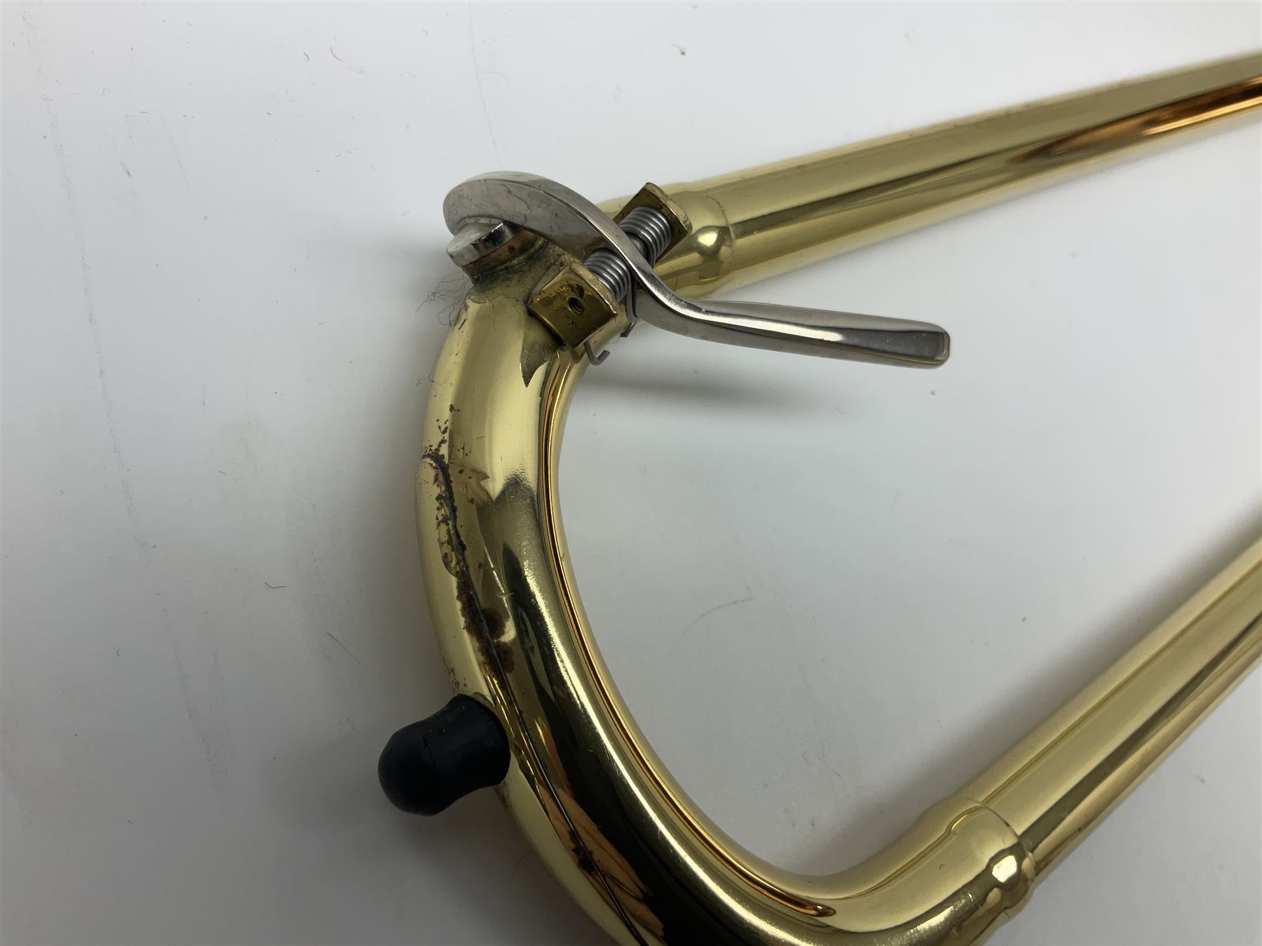 Sebastian Bucklet Aquae Sulis copper and brass trombone No.0910004; in lightweight carrying case; and Kinsman folding tubular chrome music stand in case (2)