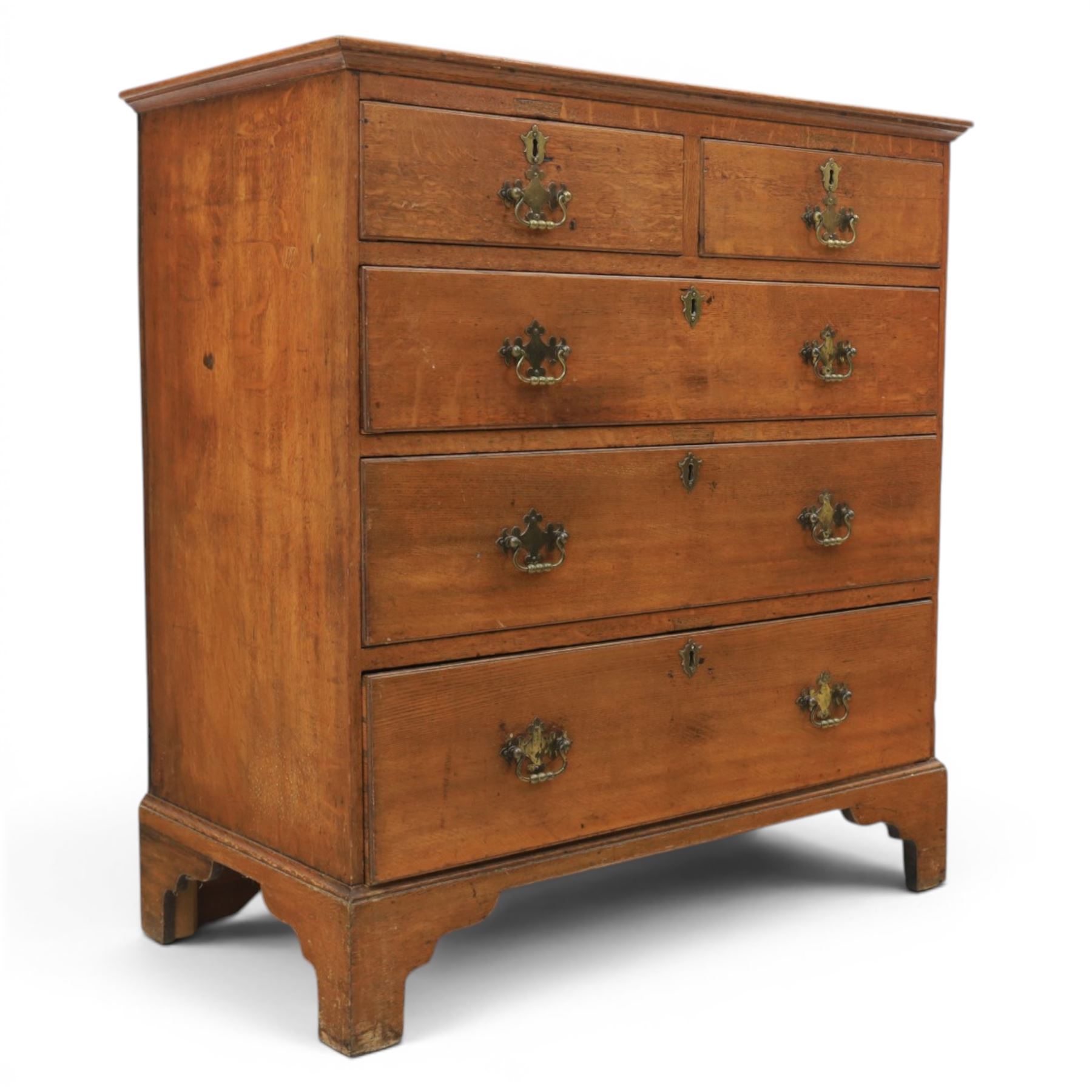 18th century oak chest, moulded rectangular top, above two short over three long graduating drawers, fitted with pierced brass escutcheons and swan neck handles, on bracket feet 