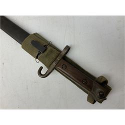Austrian Model 1895 carbine NCO's knife bayonet with 25cm fullered steel blade; in steel scabbard with webbing frog L39cm overall; and Spanish Model 1941 Bolo bayonet with 25cm fullered steel blade No.6412D; in steel scabbard (2)
