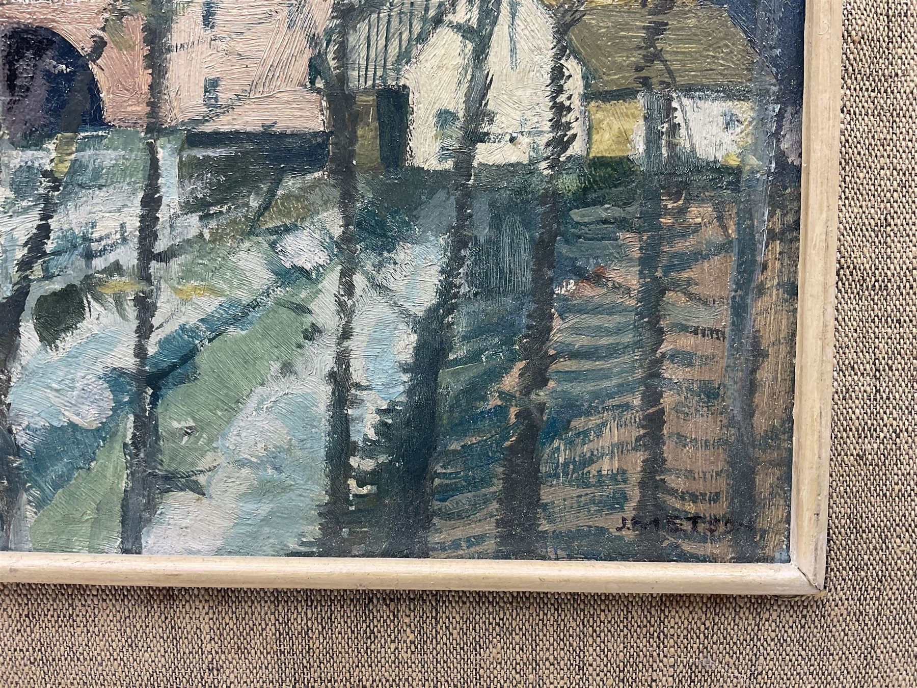 Jack C Metson (British 1905-1987): 'Breton Village', oil on board signed, artist's address label verso 20cm x 23cm