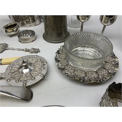 Collection of silver plate, to include ladle, butter dish with cover and stand, teapot, fish server, Dutch toast fork, cocktail shaker, etc., plus glove stretchers with hallmarked silver handles, three petwer mugs, etc., in one box 