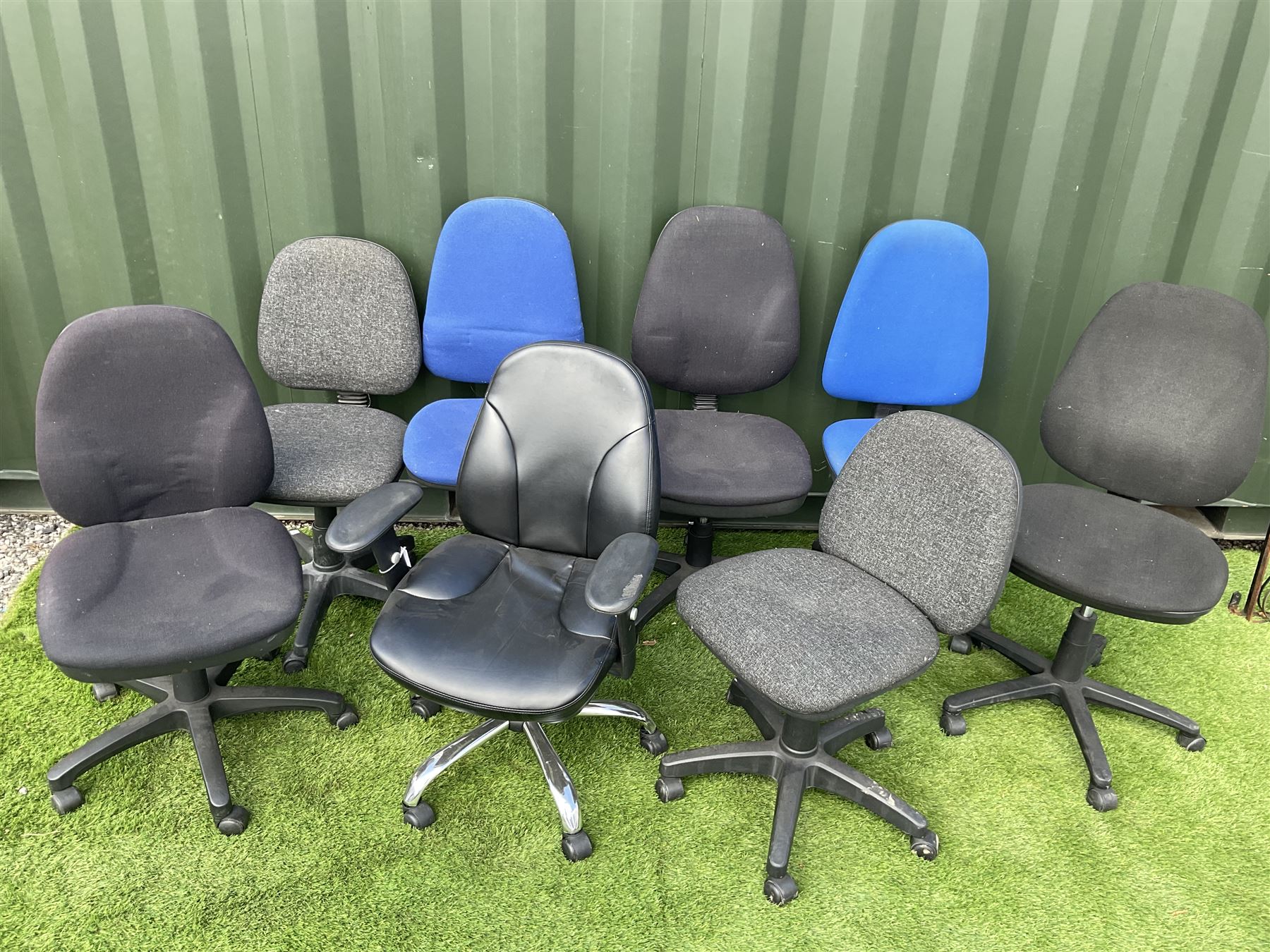 Set of eight office chairs on castors. THIS LOT IS TO BE COLLECTED BY