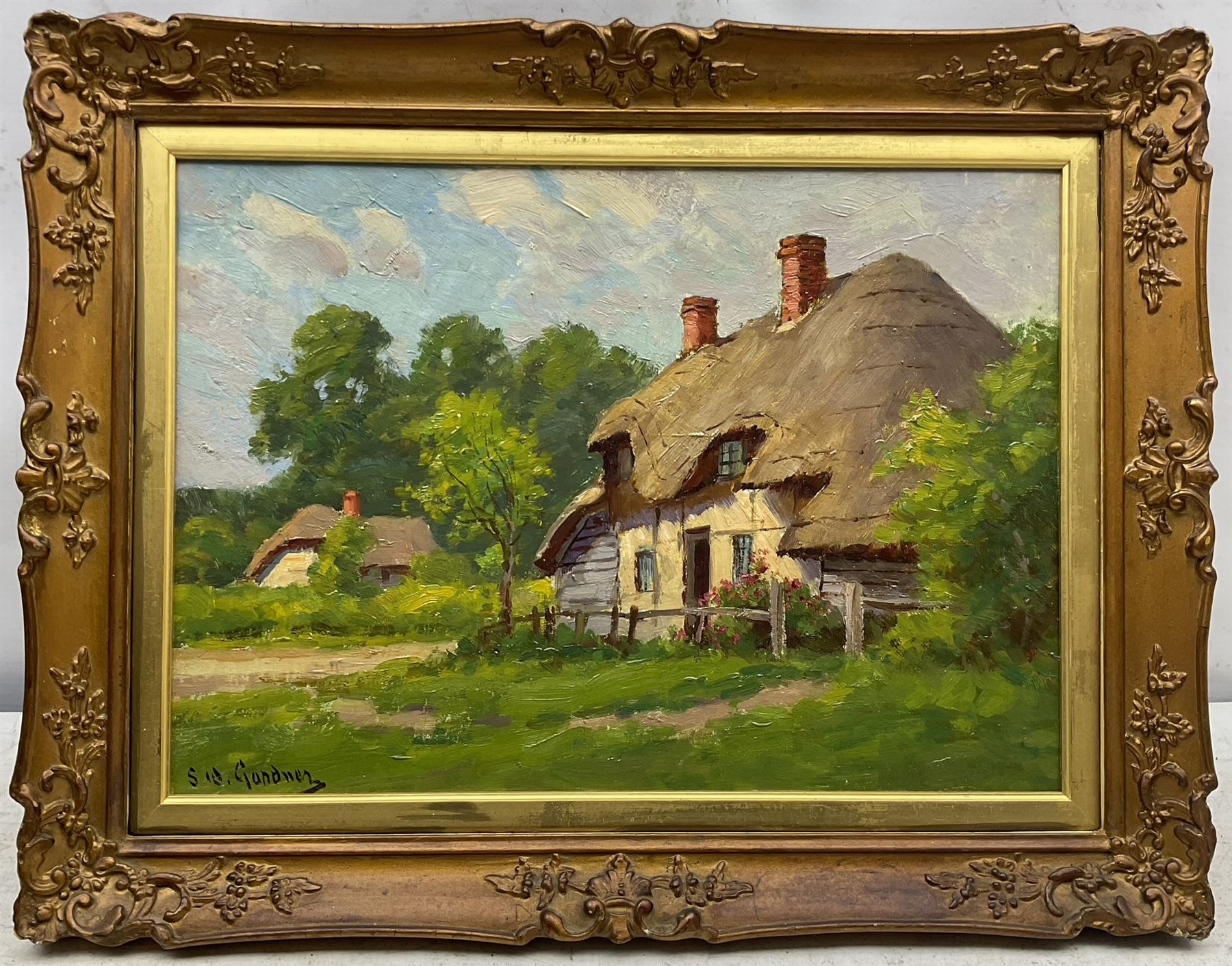 Sidney Valentine Gardner (Staithes Group 1869-1957): The Thatched Cottage, oil on canvas laid on to board signed 24cm x 34cm