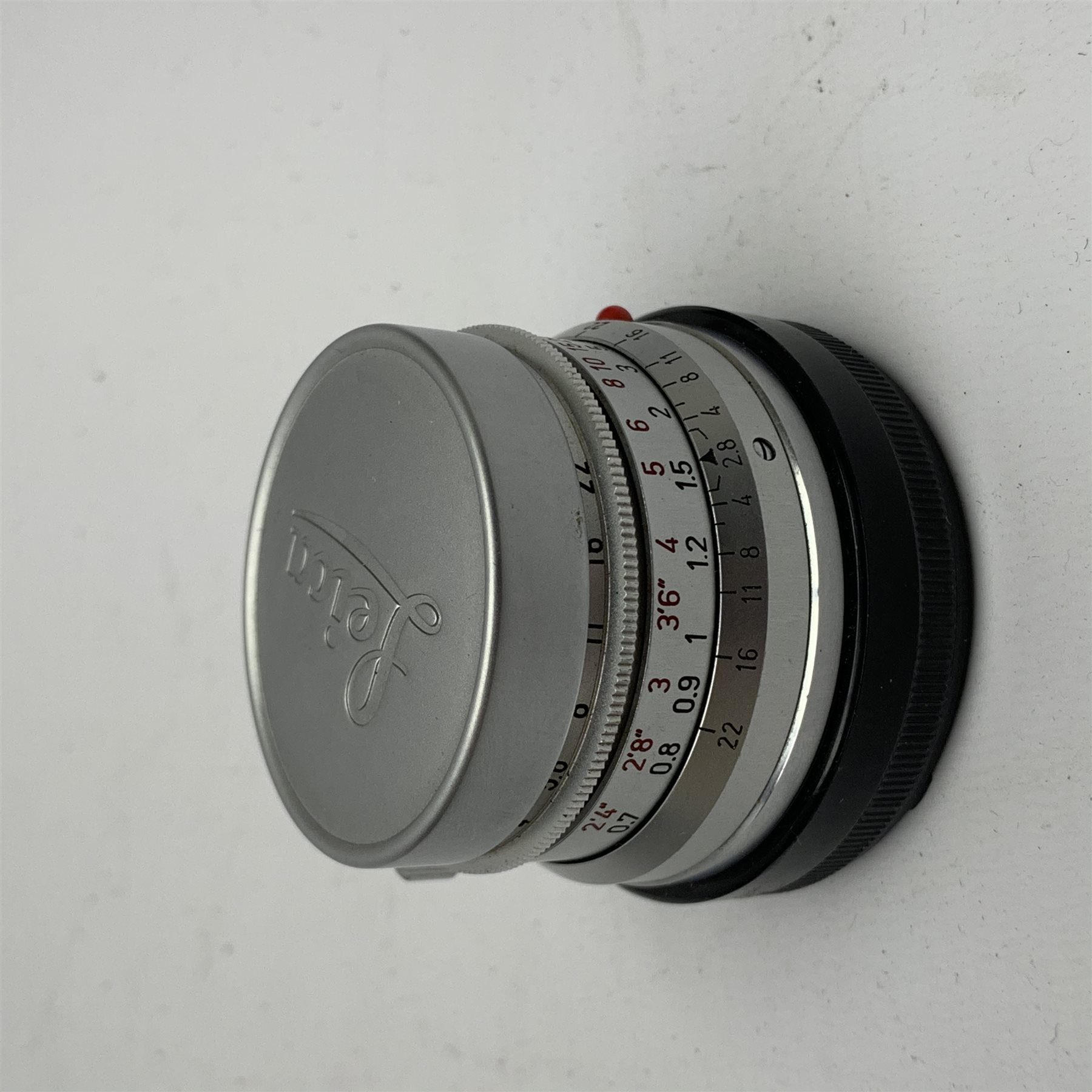 Leica M2-1013180 camera fitted with Leica Summicron 1:2/50 Leitz Wetzlar lens (1764800) and UVa filter, and Leica-Meter MR in leather case together with; Leica Elmarit 1:2.8/90 LW lens (1805634), Leica Summaron 1:28/35 LW lens (1782507), Leica M3 M2 adapter ring, Leica filters yellow and orange cased, three Leica lens hoods IUFOO, IROOA and 12585H (boxed), Leica pocket book, guide and 1960s survey catalogue & price guide leaflet, with original M2 camera box