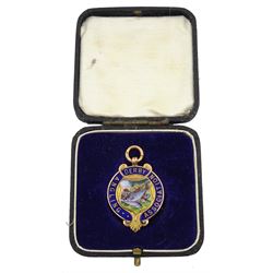 Gold enamel  'Derby Angling Association' medallion, inscribed verso and dated 1921, stamped 9ct