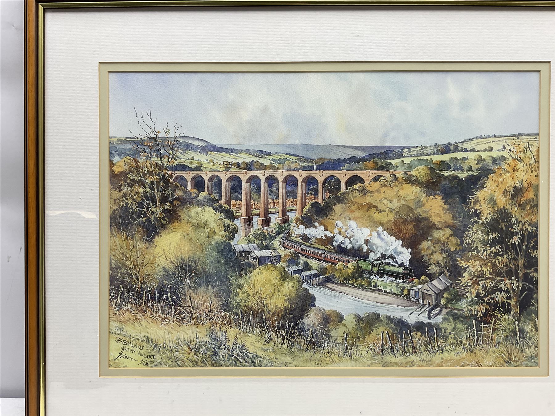 John Freeman (British 1942-): 'Whitby Viaduct' and Launching the Lifeboat 'Robin Hood's Bay', pair limited edition prints signed and numbered 6/500 and 28/850, respectively, 34cm x 49cm and 24cm x 35cm