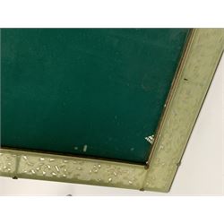 Early 20th century Chinese jade mounted photograph frame, of rectangular form the pierced jade frame carved with flowers and birds, the top panel carved with Foo dogs flaking an applied carved lavender coloured boss, with easel support verso, H33cm
