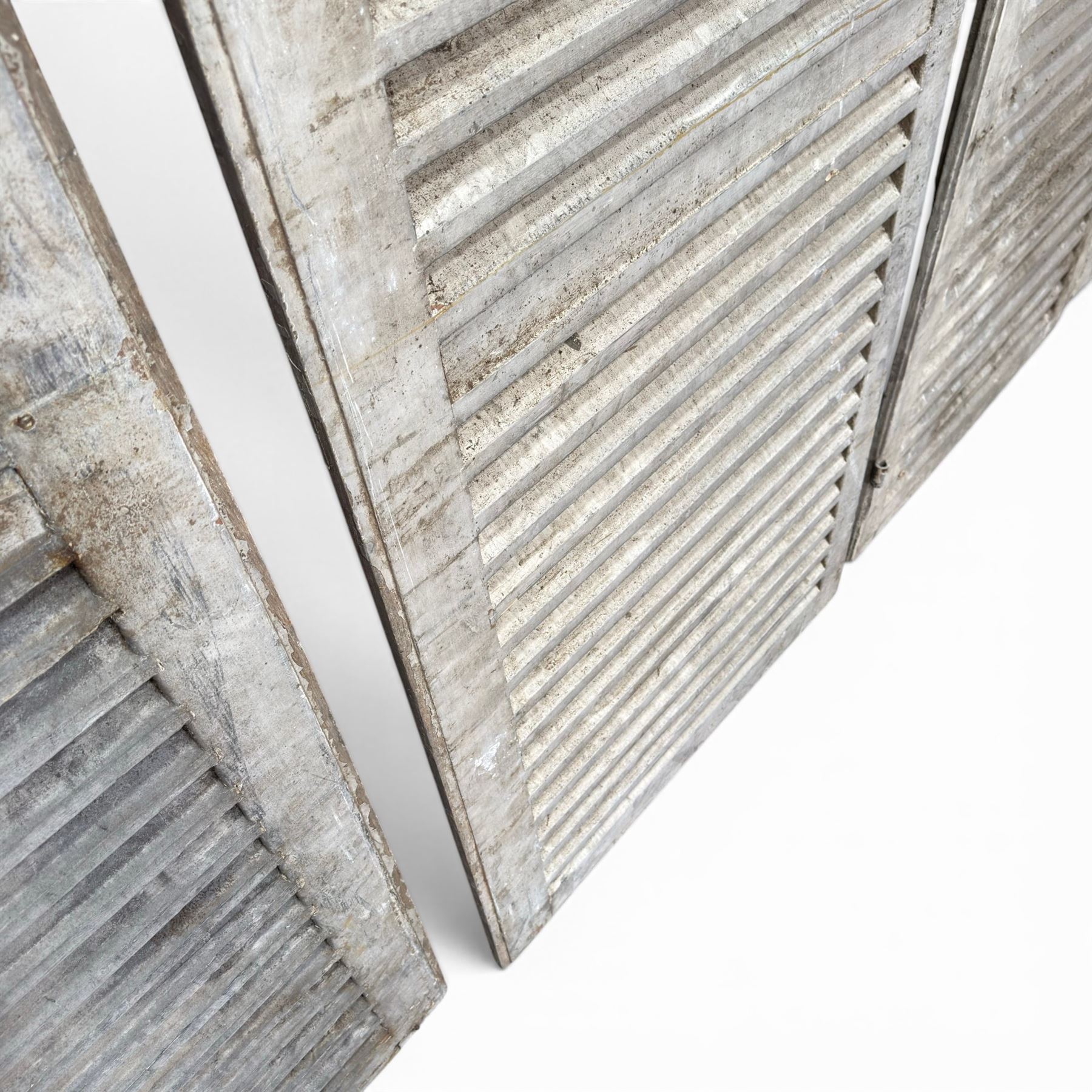 Five 19th century full height French Chateau louvre doors, pitch pine painted in cream finish, two having iron rod hinges, dimensions approx.