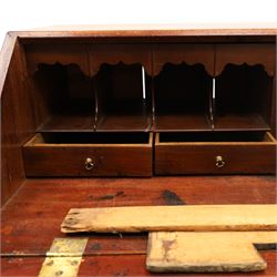 George III mahogany bureau of large proportions, the fall-front enclosing fitted interior with fluted column secret compartments and assorted pigeonholes and correspondence drawers flanking central cupboard, over four graduating cock-beaded drawers with original brass swan-neck handles, raised on bracket feet