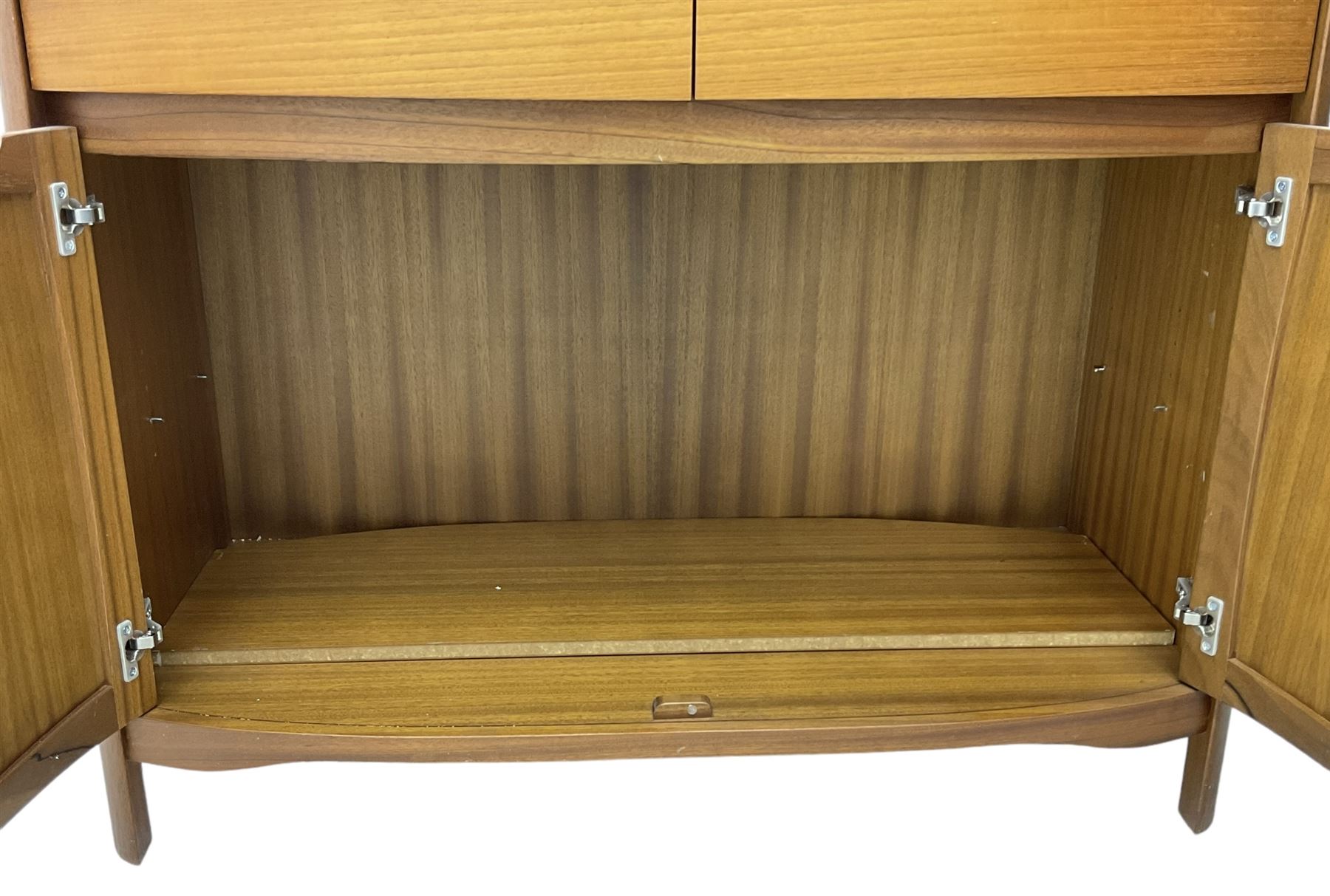 Nathan - teak wall display unit, raised display cabinet enclosed by two glazed doors, the lower section fitted with two drawers and double panelled cupboard 