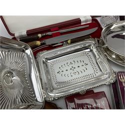 Silver plated Calibri lighter, in the form of a twin handled vase with mask handles, together with a pair of silver plated candle sticks, horn handled carving set with hallmarked silver ferrules and other silver plated items