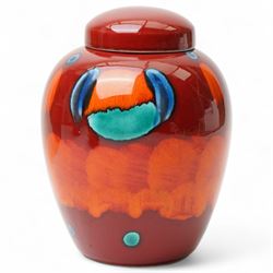 Four Poole pottery 'Volcano' pattern items comprising charger