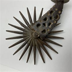 Pair of South American gaucho steel and brass spurs with twenty-two spike heel rowels, possibly Chilean L23cm