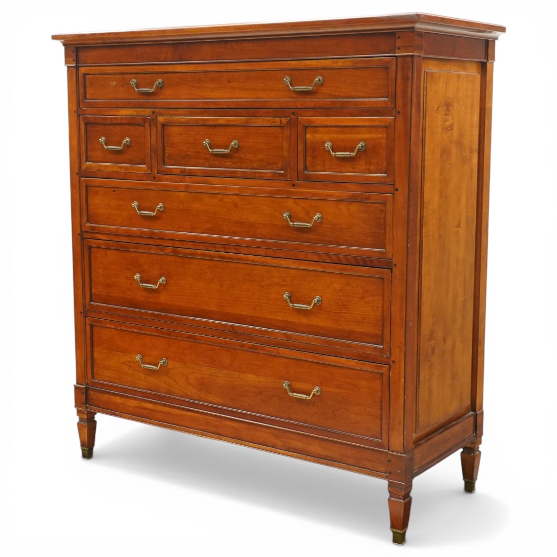 Willis & Gambier - 'Directoire' tall chest of drawers, rectangular top above an arrangement of seven drawers, raised on tapered and turned feet