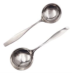 Pair of Danish silver Charlotte pattern soup spoons, engraved with initial to underside, stamped Hans Hansen Sterling Denmark 925