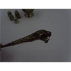 Group of silver sewing accessories, to include button hook, with silver leopard's head handle, hallmarks worn and indistinct, an Edwardian silver pin cushion, with embossed rose decoration and removable beaded pin cushion, hallmarked Charles Boyton & Son Ltd, London 1905 and five silver thimbles, including one continental silver example, all stamped or hallmarked 