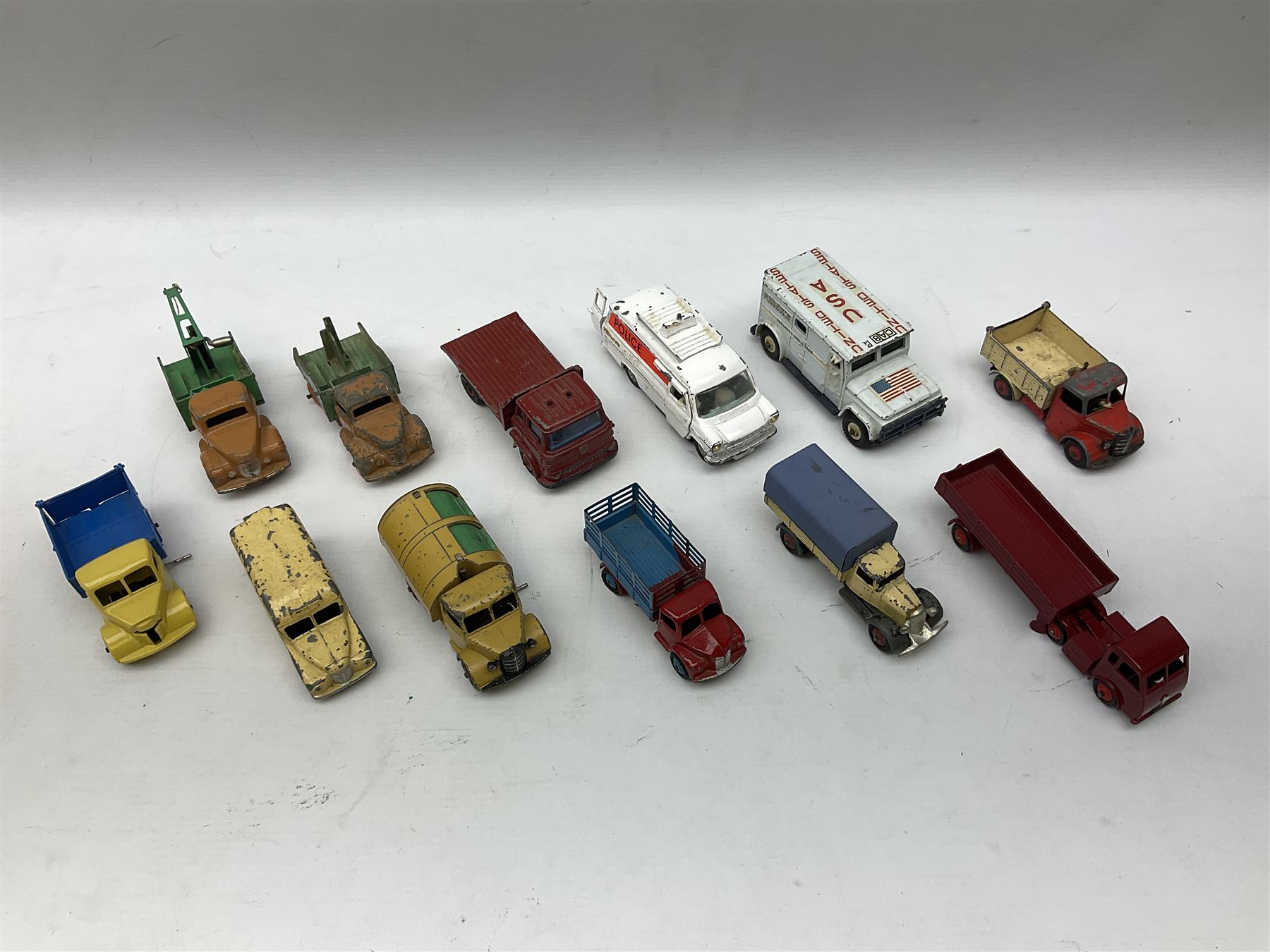 Dinky - twelve unboxed and playworn/repainted die-cast commercial vehicles including Hindle Smart Helecs, two Bedford tipper trucks, Dodge tipper truck, two Commer breakdown trucks, Brinks Armoured Car, Bedford Refuse wagon etc (12)