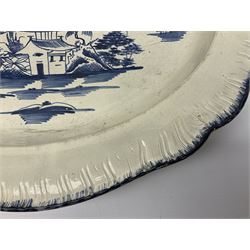 Late 18th/early 19th century pearlware platter, possibly John Warburton of Cobridge, of shaped oval form with shell/feather edge, the centre decorated in the Chinese manner with islands and huts, impressed verso I. Warburton, L43cm