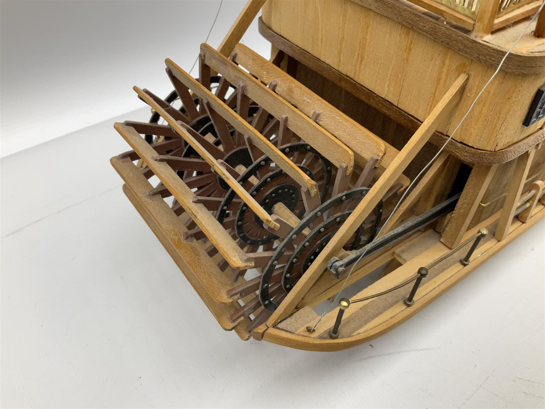 Hand built model of a river paddle steamer 'King of the Mississippi' and a sailing ship with three masts and unfurled sails, largest example H80cm, L101cm