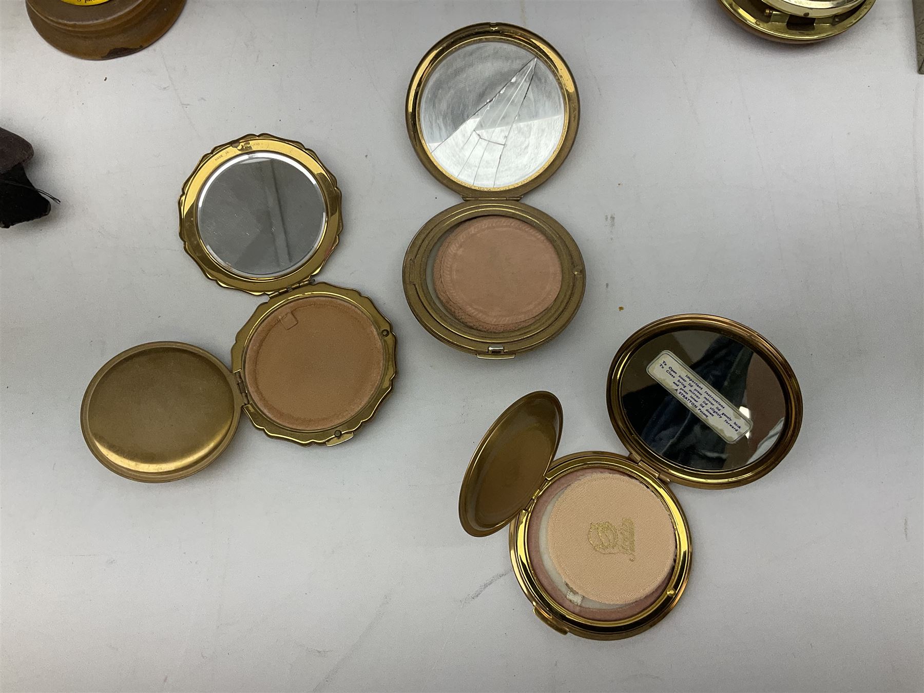 Silver 1969 Cunard RMS Queen Elizabeth maiden voyage commemorative medallion, in original Slade, Hampton & Son case with certificate, two Stratton R.M.S Queen Elizabeth mirror compacts, Stratton R.M.S Queen Mary compact, mid 20th century P&O Canberra Round World Voyage miniature globe, S.S Oriana ash tray modelled as a barrel, Norah Wellings sailor doll, and other maritime and shipping memorabilia 